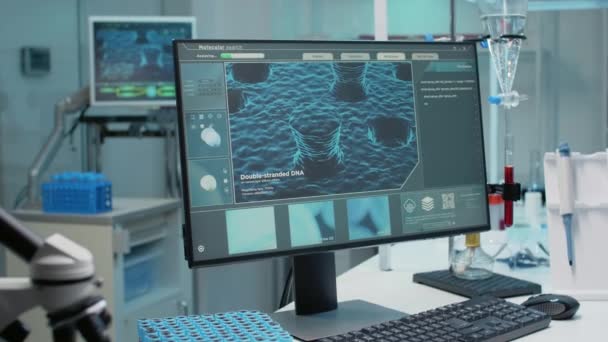 Sala laboratorio vuota con animazione del DNA sul monitor — Video Stock