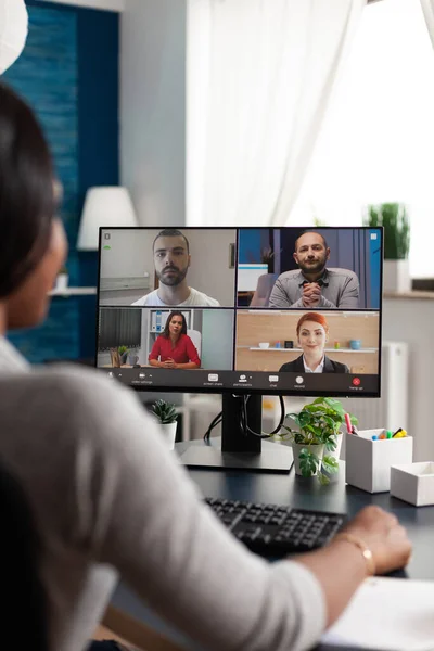 African american student discussing high school ideas with college team having online teleconference — стокове фото