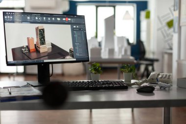 Masasında bilgisayar olan mimarlar için boş bir ofis