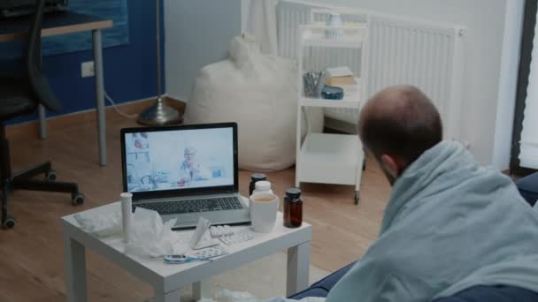 Man with disease using video call for telemedicine — Stock Video