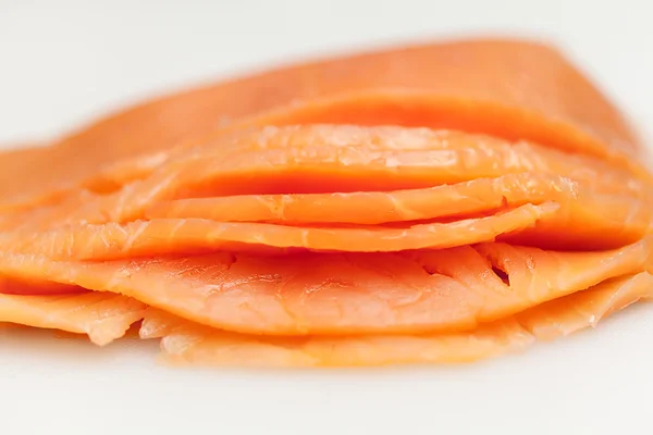 Salmon on white board for sushi preparation — Stock Photo, Image