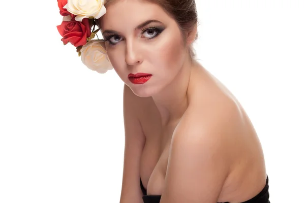 Prachtige sexy model met bloemen in hoofd — Stockfoto