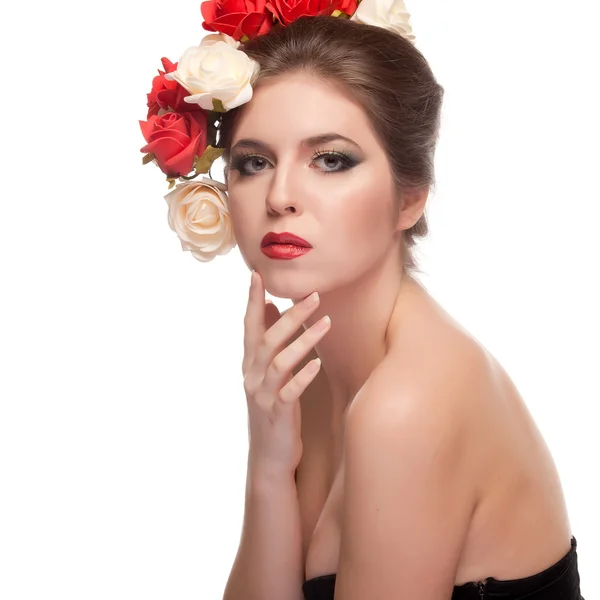 Beautiful girl with red lips and flowers in head — Stock Photo, Image