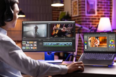 Serbest çalışan videograf evde çalışır, bilgisayardaki ve masaüstü bilgisayarındaki ses ve görselleri rafine eder. Genç Asyalı adam prodüksiyon sonrası kurguyu seviyor, sinematik hikayeleri titizlikle şekillendiriyor..