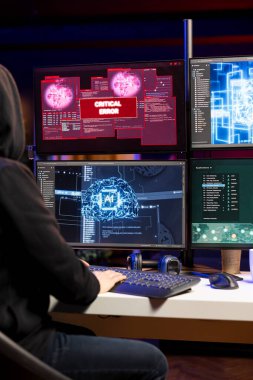 Hacker, yapay zeka fidye yazılımı kullanarak bilgisayar sabotajı yaparken kritik hata uyarısı alıyor. Derinlemesine öğrenme teknolojisiyle güvenlik duvarlarını aşmaya çalışırken hata uyarısı alan düzenbaz programcı