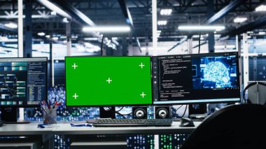 Sunucu odası Chroma anahtar bilgisayarları, yapay zeka operasyonları için veri toplama makinelerini takip ediyor. AI büyük dil model geliştirmede kullanılan yeşil ekran bilgisayarlar izleme donanımı