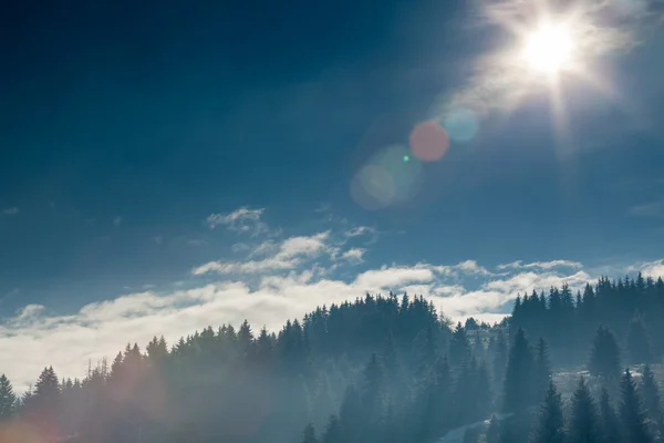 Sun over beautiful mountains landscape