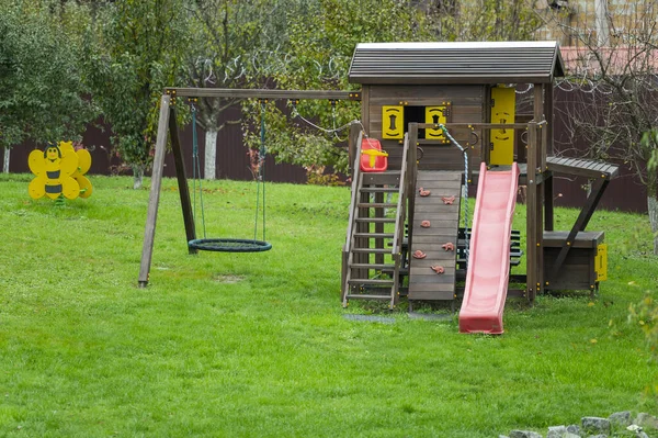 Wooden Playground Plastic Elements Swings Slides Children Garden — Stock Photo, Image