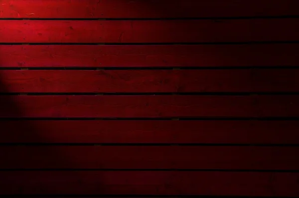 Old  dark red painted wooden wall  - texture or background — Stock Photo, Image