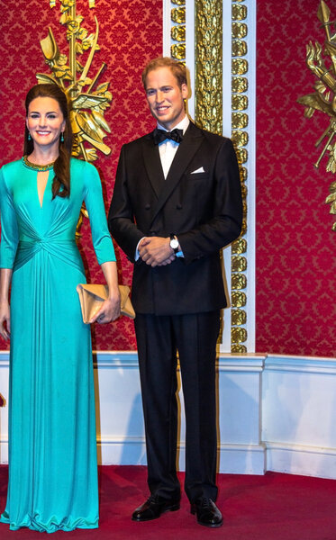Wax figures of Prince William and Kate Middleton are seen on display at Madame Tussauds museum. London. UK