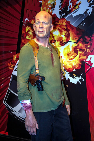 Bruce Willis as John McClane in the Madame Tussaud  wax museum, London,UK Marie Tussaud was born as Marie Grosholtz in 1761