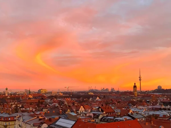 Beautiful pink orange sunset over the city Munich