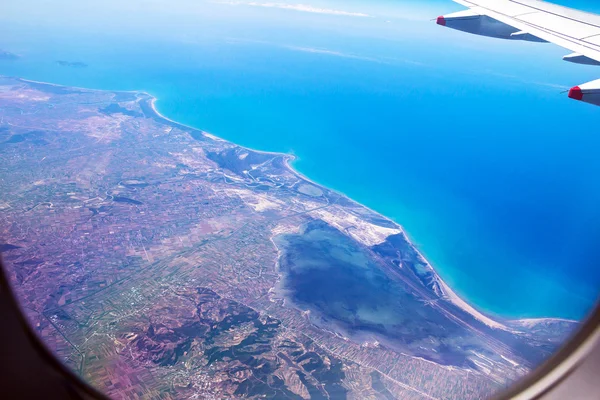 Flight Over Rhodes on deep blue sky background with soft focus — Stock Photo, Image