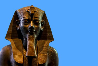Seated statue of Amenhotep III on blue  background, British Museum clipart