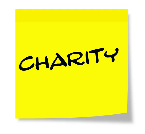 Charity written on a yellow sticky note — Stock Photo, Image