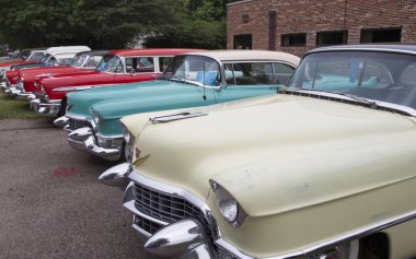 Row of Vintage 1950's Cadillac Cars clipart