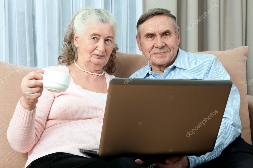 Elderly couple having fun Stock Photo by ©victoreus 106328058