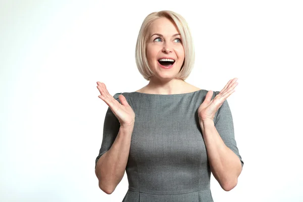 Woman looking sideways in excitement. — Stock Photo, Image