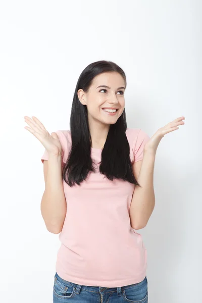 Surprised happy woman looking sideways in excitement. — Stock Photo, Image