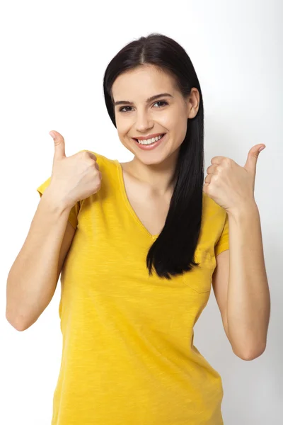 Happy attractive young woman showing thumbs up, okay. Isolated — Stock Photo, Image