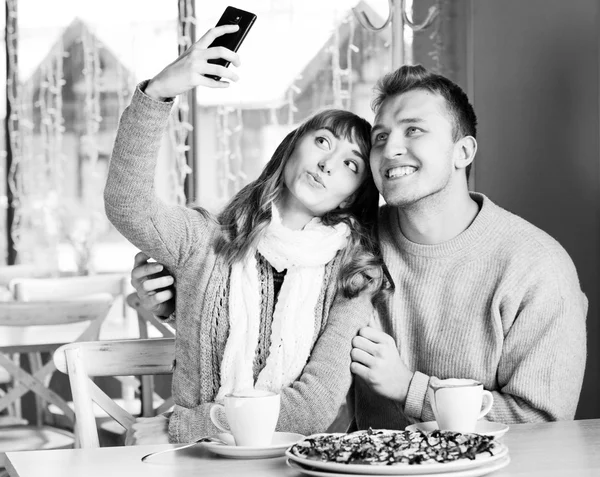 Holidays, vacation and happiness concept - young couple. black and white — Stock Photo, Image