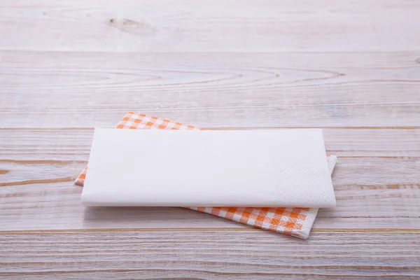 Paper napkin on old wooden table. place for text — Stock Photo, Image