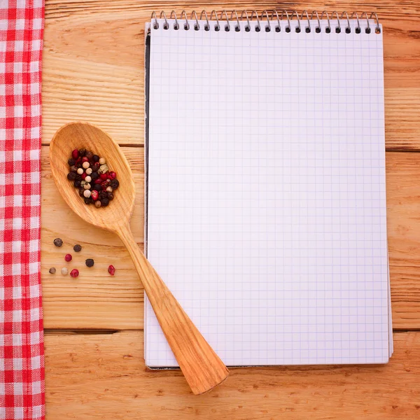 Pure notebook for recording menu, recipe on red checkered tablecloth tartan. — Stock Photo, Image