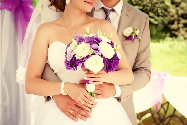 Wedding couple bride and groom holding hands. — Stock Photo, Image