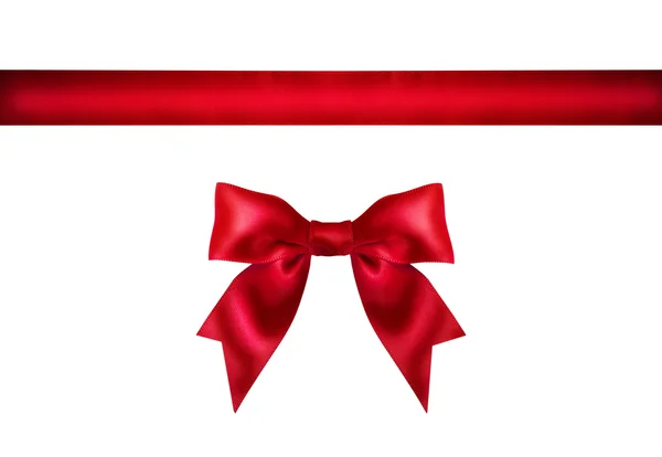 Red ribbon bow on white background. — Stock Photo, Image