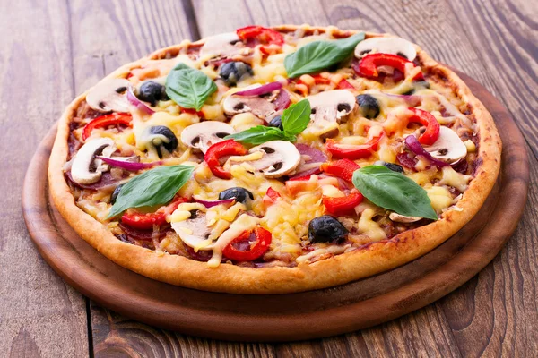 Pizza with seafood on wood table — Stock Photo, Image