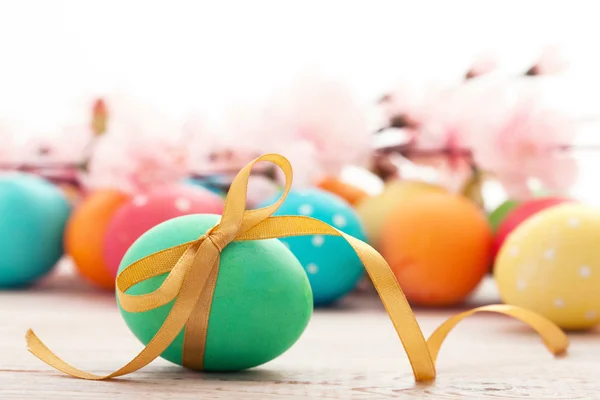 Easter eggs on wooden background — Stock Photo, Image