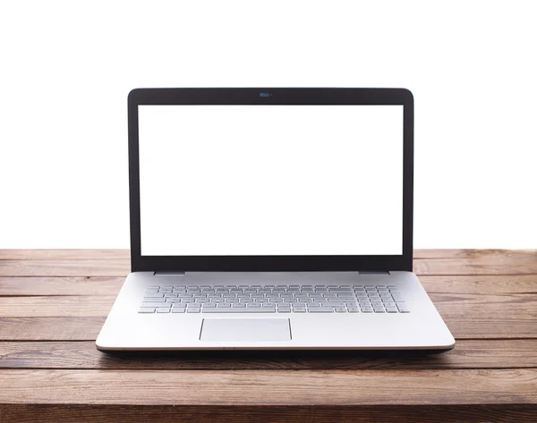 Laptop moderno na mesa de madeira isolada — Fotografia de Stock