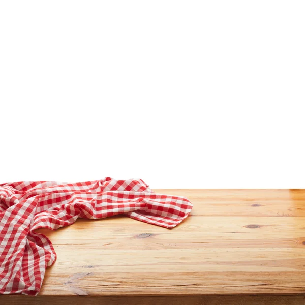 Tablecloth on wooden deck table, white background.