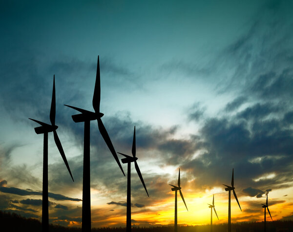 Windmills on the storm sky background