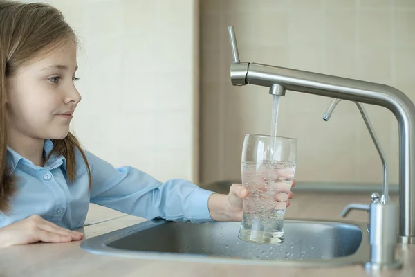 Little Girl Open Water Tap Her Hand Holding Transparent Glass — Stock Photo, Image