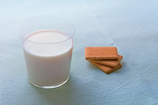 Tři sušenky a mléko Stock Fotografie