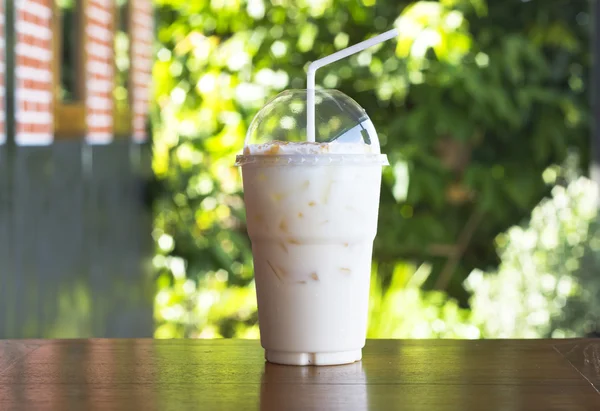 Ice milk on wood — Stock Photo, Image