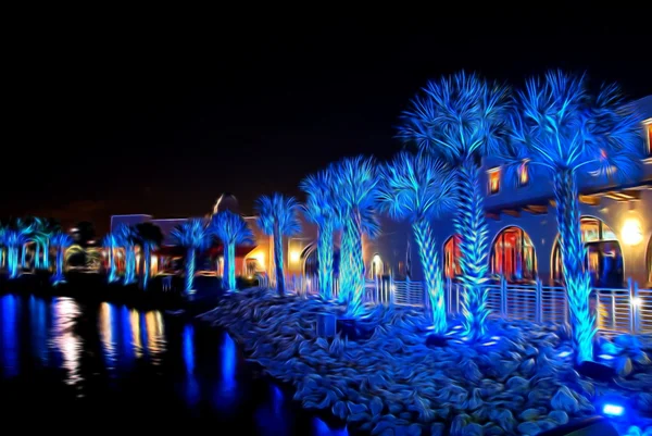 Palmen onder blauw licht — Stockfoto