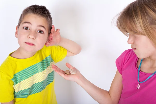 Little deaf boy — Stock Photo, Image