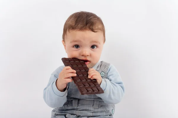 Bebek ve çikolata — Stok fotoğraf