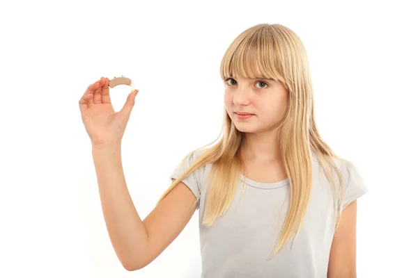 Menina com aparelho auditivo — Fotografia de Stock