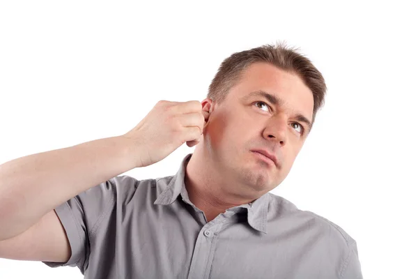 Man putting on hearing aids — Stock Photo, Image