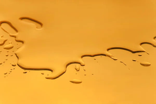 Sıvı altın renk arka plan — Stok fotoğraf