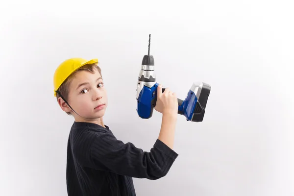 Menino Usando Capacete Protetor Brinquedo Posando Com Uma Broca Estúdio — Fotografia de Stock