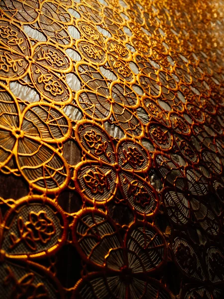 Tecido texturizado de padrões de cor dourada . — Fotografia de Stock