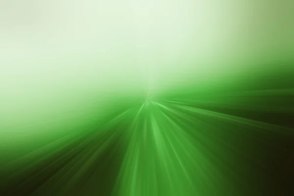 Bright white flash on a green and black background. — Stock Photo, Image