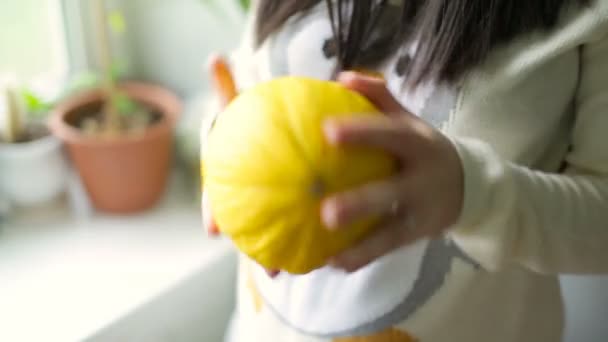 Young girl with melon in hands. — Stock Video