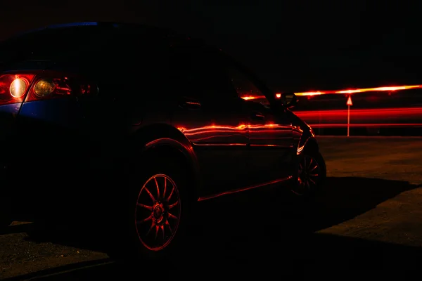 Car near the highway at night — Stock Photo, Image