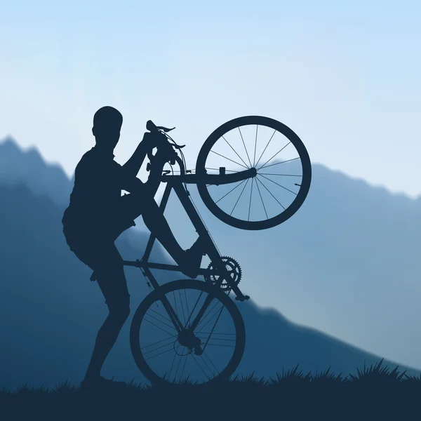 Ciclista en las montañas — Vector de stock