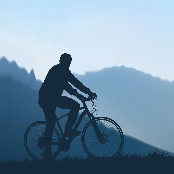 Cyclist in the mountains — Stock Vector